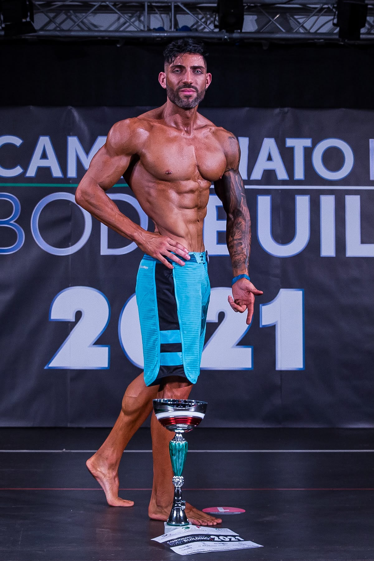 Mario Mattei sul palco del Campionato Italiano di Bodybuilding 2021
